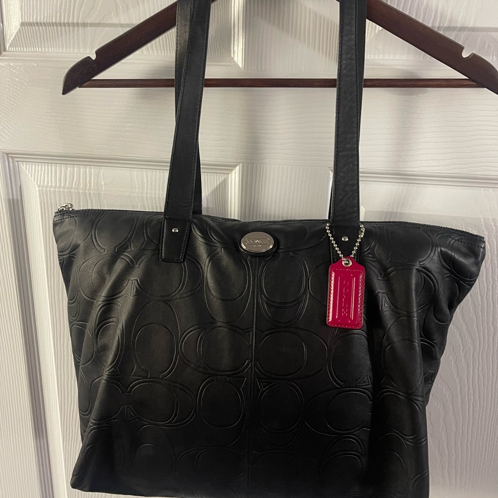 COACH BLACK EMBOSSED C’s SOFT LEATHER WITH HOT PINK HANG TAG.
